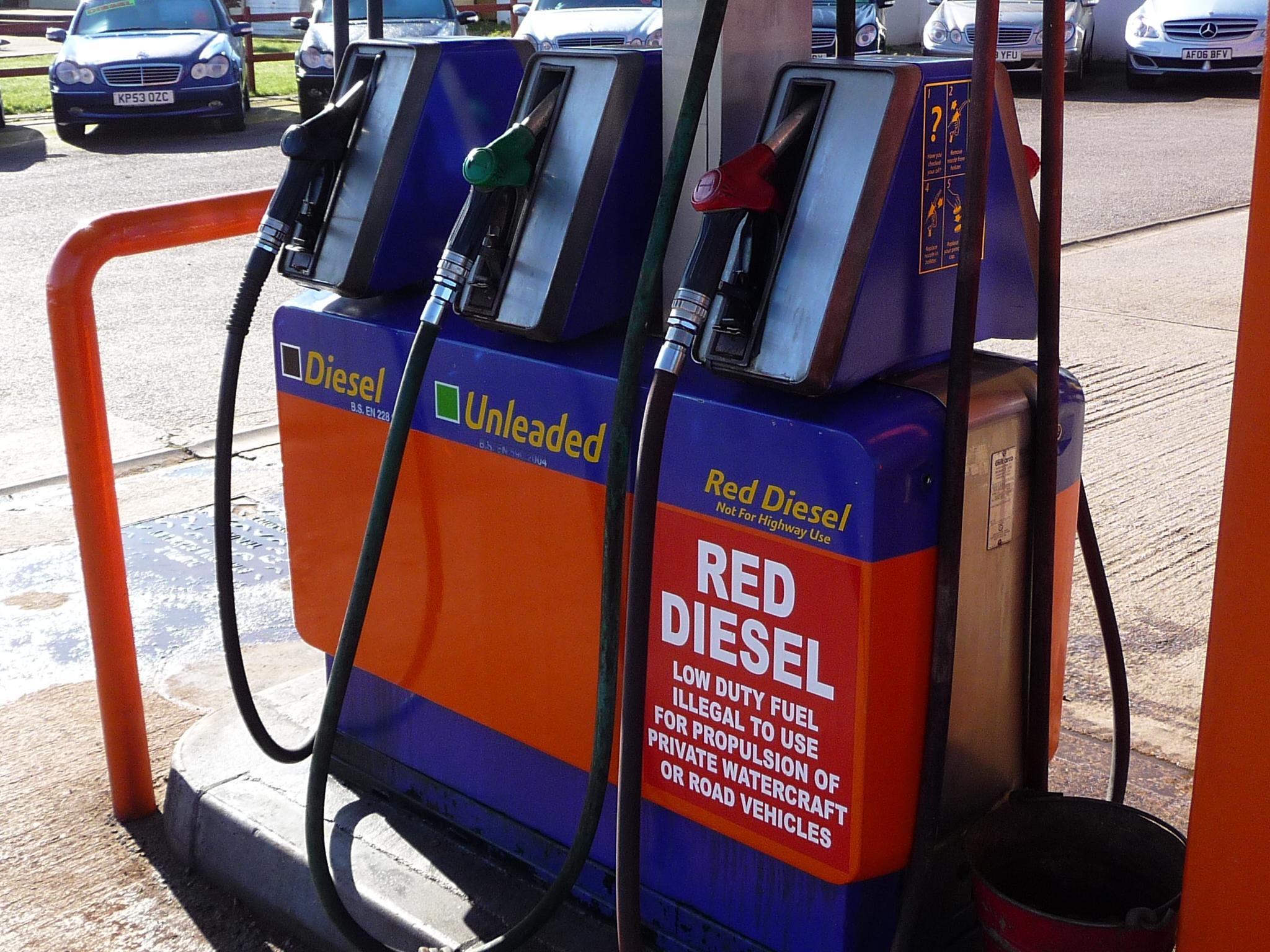 red diesel pump next to a diesel and unleaded pump - misfuel potential